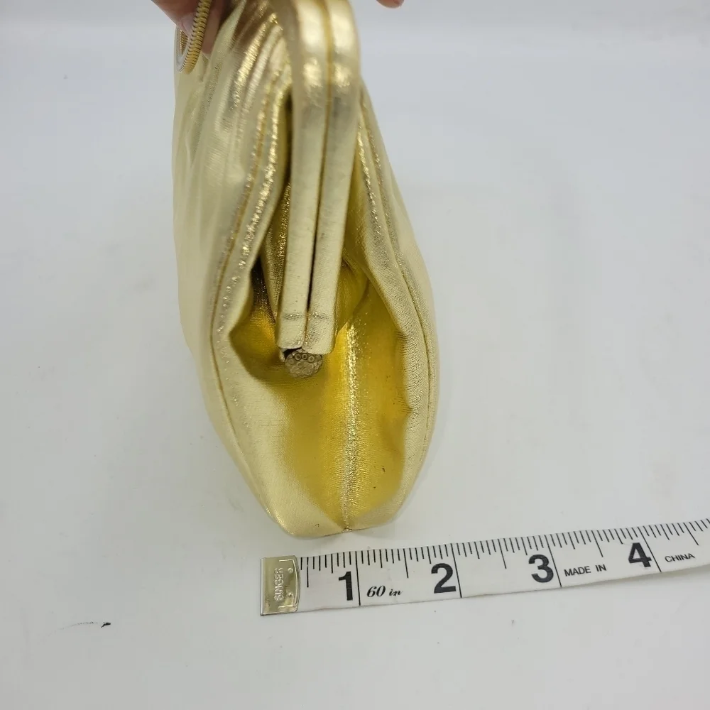 Vintage Andé Gold Clutch With Rhinestone Details Clasp.